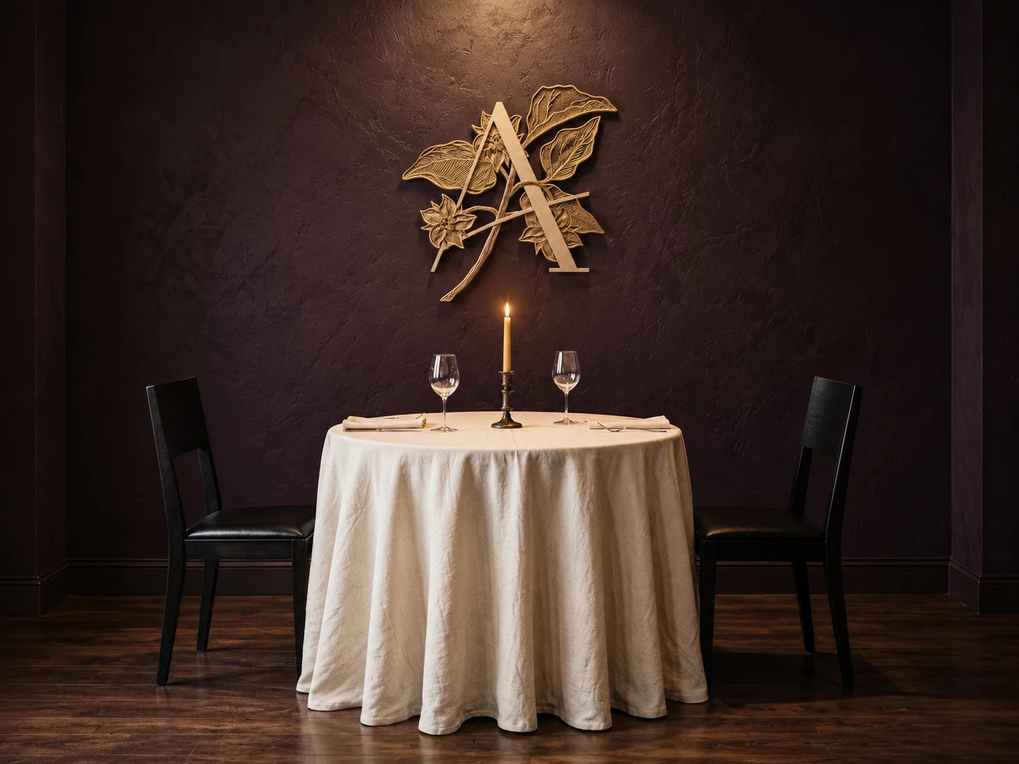 Candlelit dining-room composition with the gold Aubergine crest, an ivory linen table for two, and dark wooden chairs