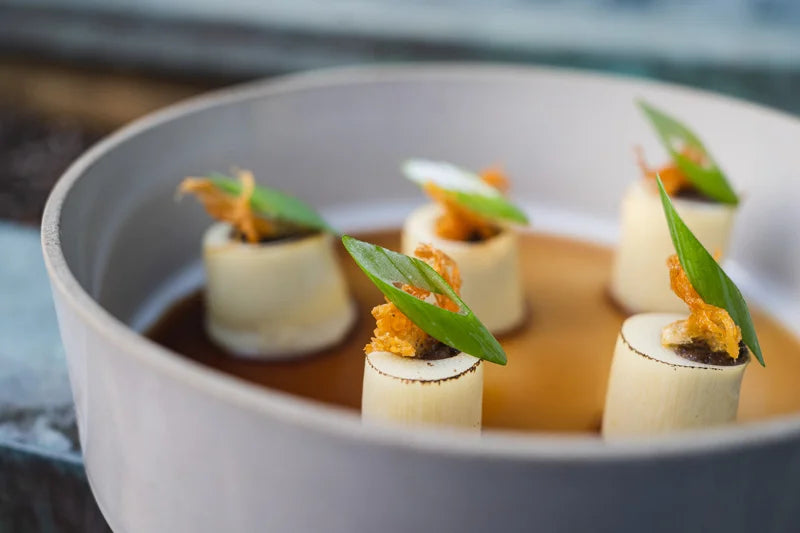 Small handcrafted bites with fresh herbs